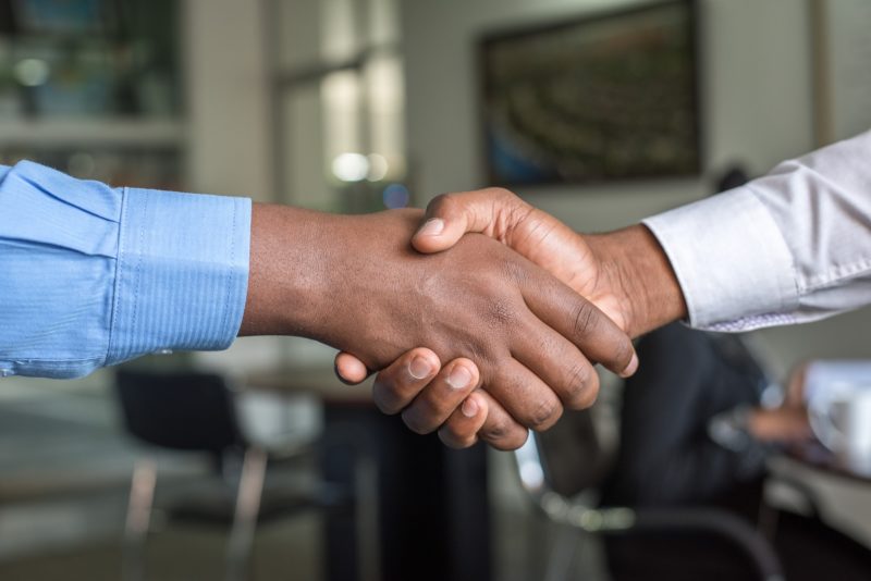 Candidate and interviewer shaking hands after an interview.