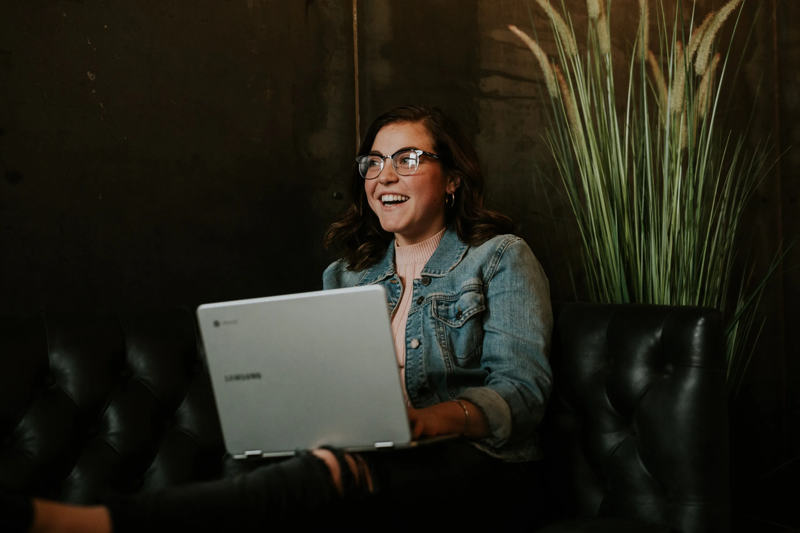 girl with laptop with flower in the office