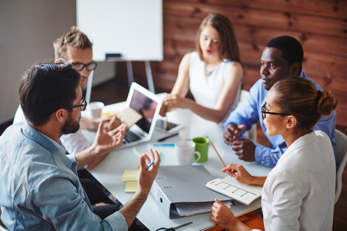 Hiring team discussing online developer testing