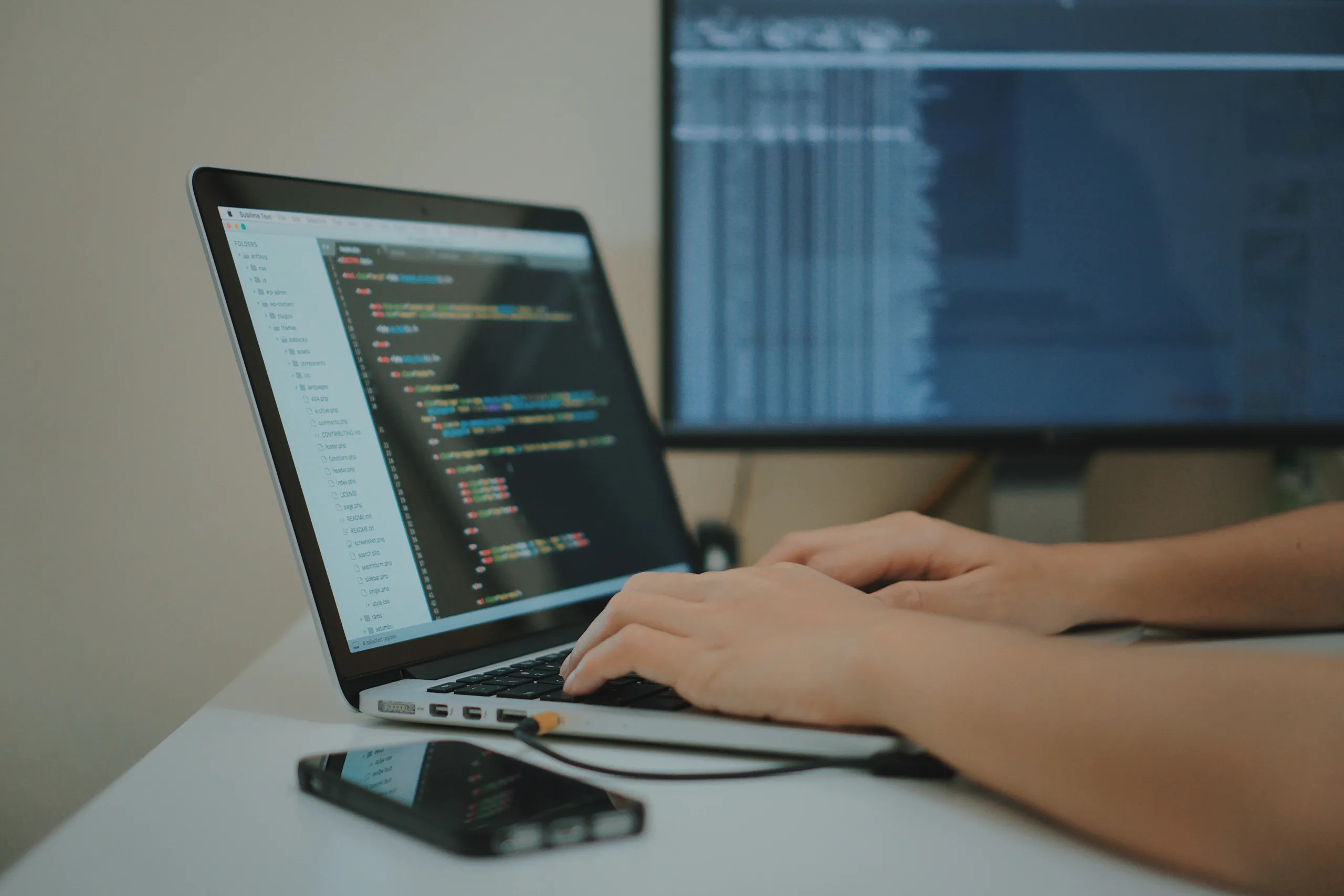 screen with IDE and code